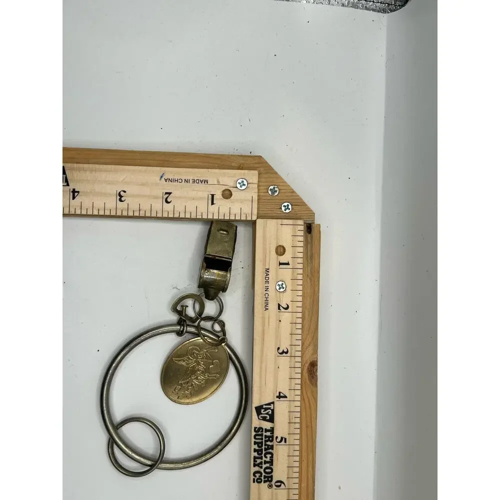 Vintage Brass Whistle Keychain with Angel Medallion Collectible Rustic Gift